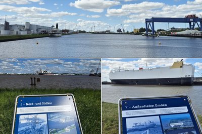 Hafen Emden mit Informationsschildern von Standorten des Hafenrundgangs